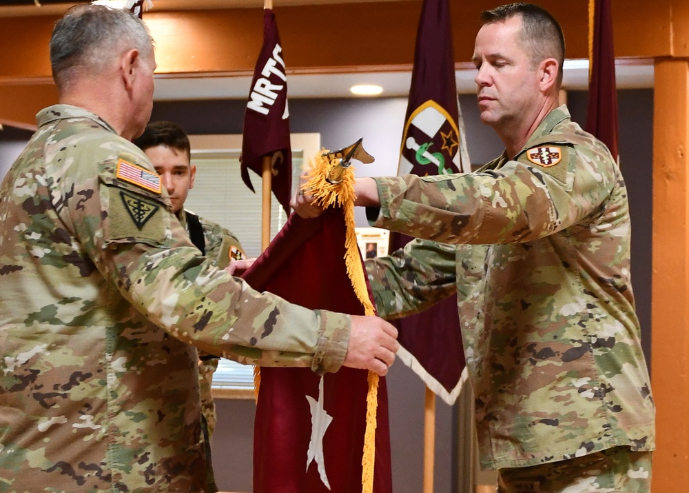 McCarter cases personal flag upon retirement