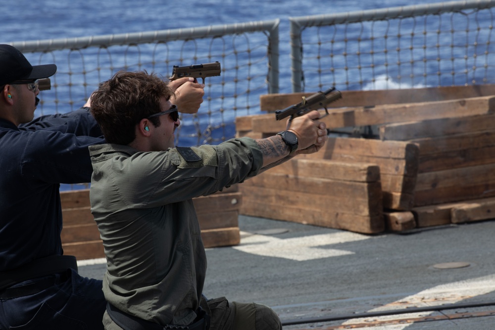 Stockdale and Helicopter Maritime Strike Squadron 71 Sailors participate in pistol qualification