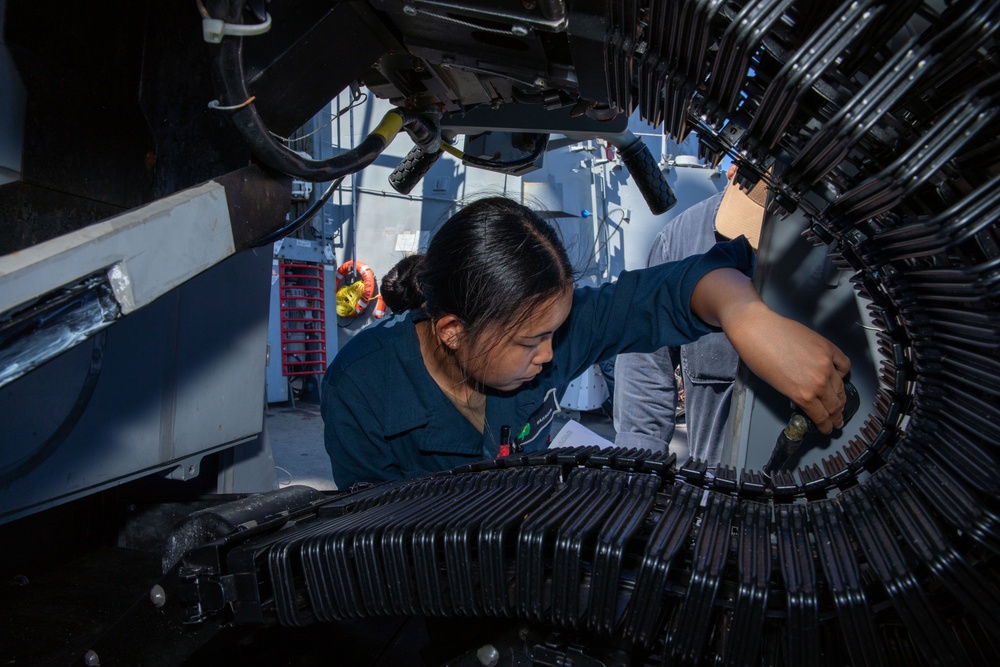 O’Kane sailor conduct maintenance on an MK 38