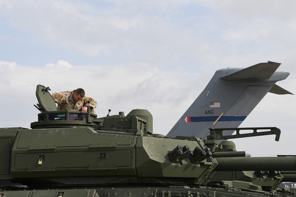 The 145th Airlift Wing loads an M10 Booker Combat Vehicle