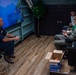 Sailors participate in a bible study aboard Abraham Lincoln