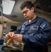 A Nimitz Sailor Repairs A Heating Element
