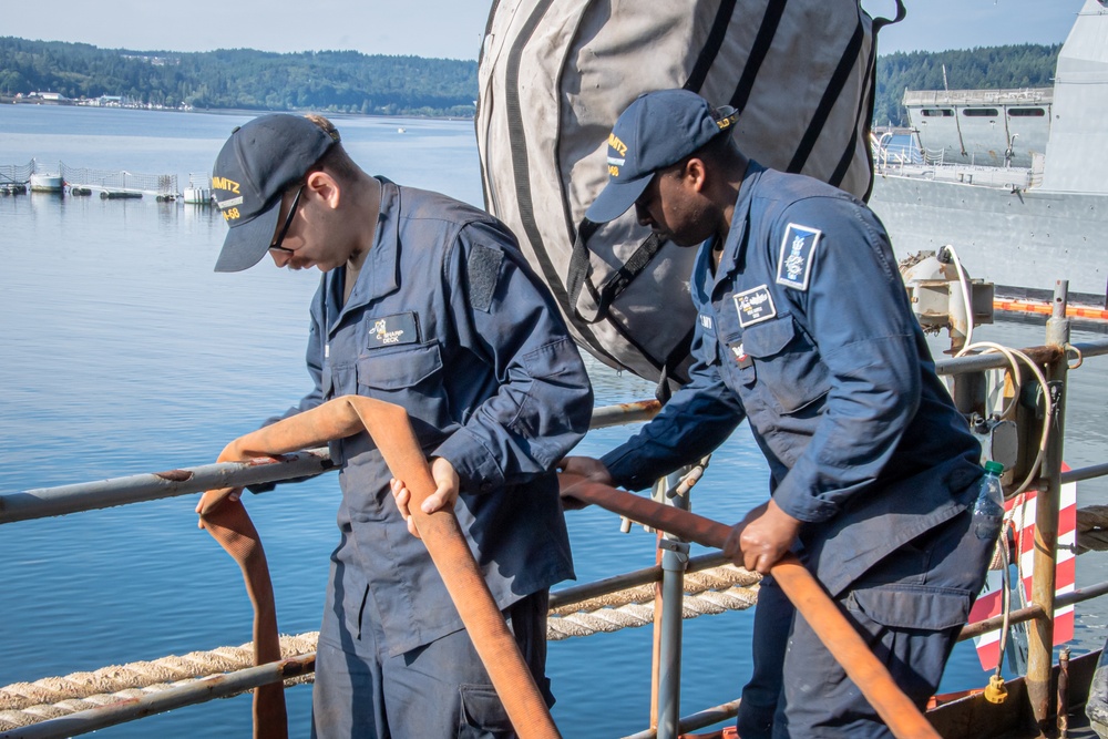 Nimitz Sailors Conduct Hydrostatic Testing On Fire Hoses Nimitz Sailors Conduct Hydrostatic Testing On Fire Hoses