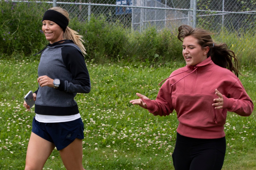 All Guard Marathon Team visits Eagle River High School cross country athletes