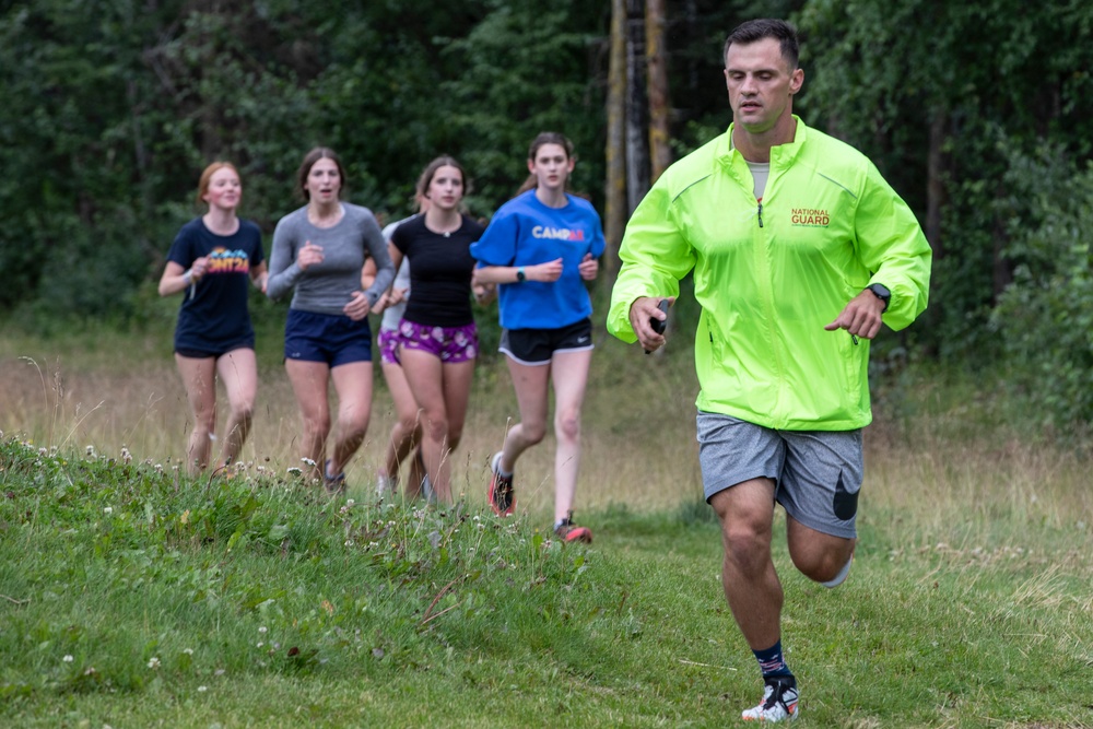 All Guard Marathon Team visits Eagle River High School cross country athletes