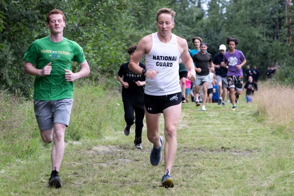 All Guard Marathon Team visits Eagle River High School cross country athletes