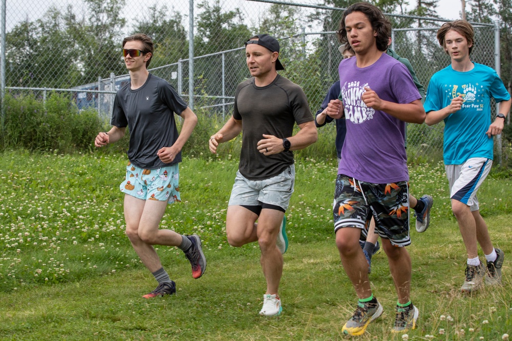 All Guard Marathon Team visits Eagle River High School cross country athletes