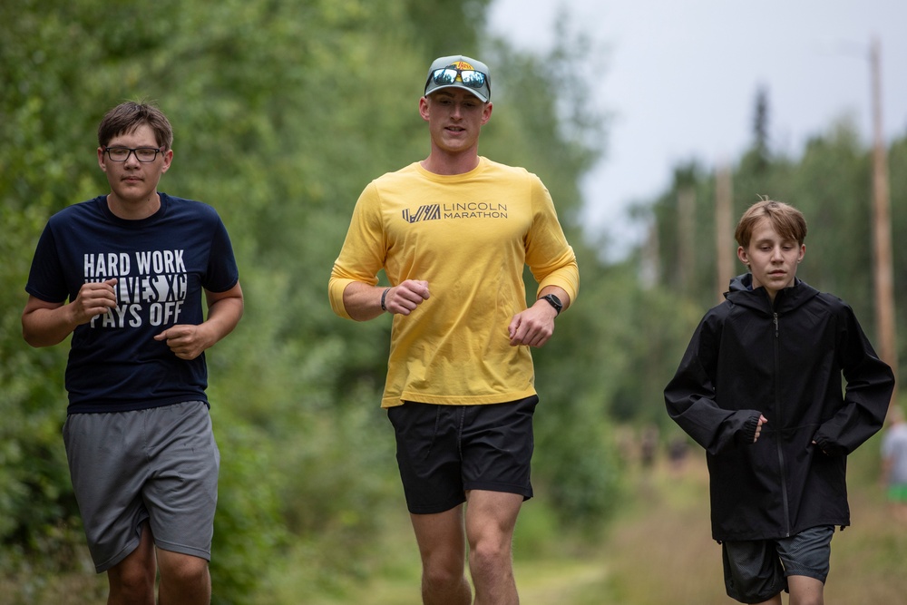 All Guard Marathon Team visits Eagle River High School cross country athletes