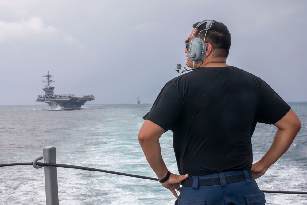 USS Spruance Sailor stands watch