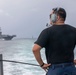 USS Spruance Sailor stands watch