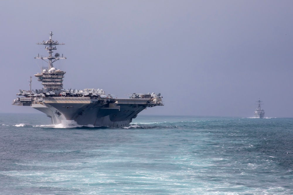 Carrier Strike Group Three sails through Singapore Strait