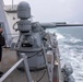 USS Spruance Sailor stands watch