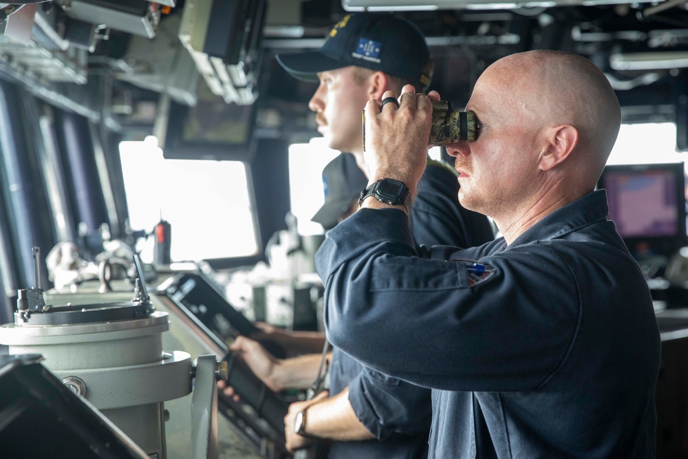 USS Spruance Commanding Officer observes strait transit