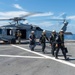 USS Blue Ridge Participates in a Sailor Transfer with the Japanese Maritime Self-Defense Force During Passing Exercise