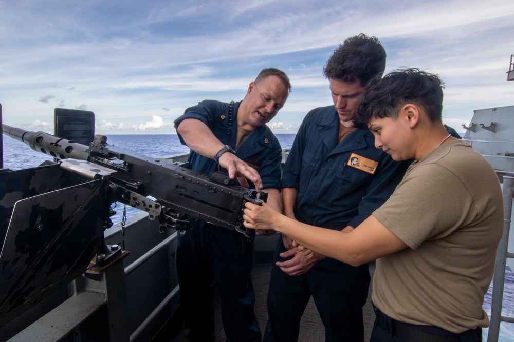 Sailors conduct training on a M2A1 .50 caliber machine gun aboard Abraham Lincoln