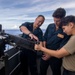Sailors conduct training on a M2A1 .50 caliber machine gun aboard Abraham Lincoln