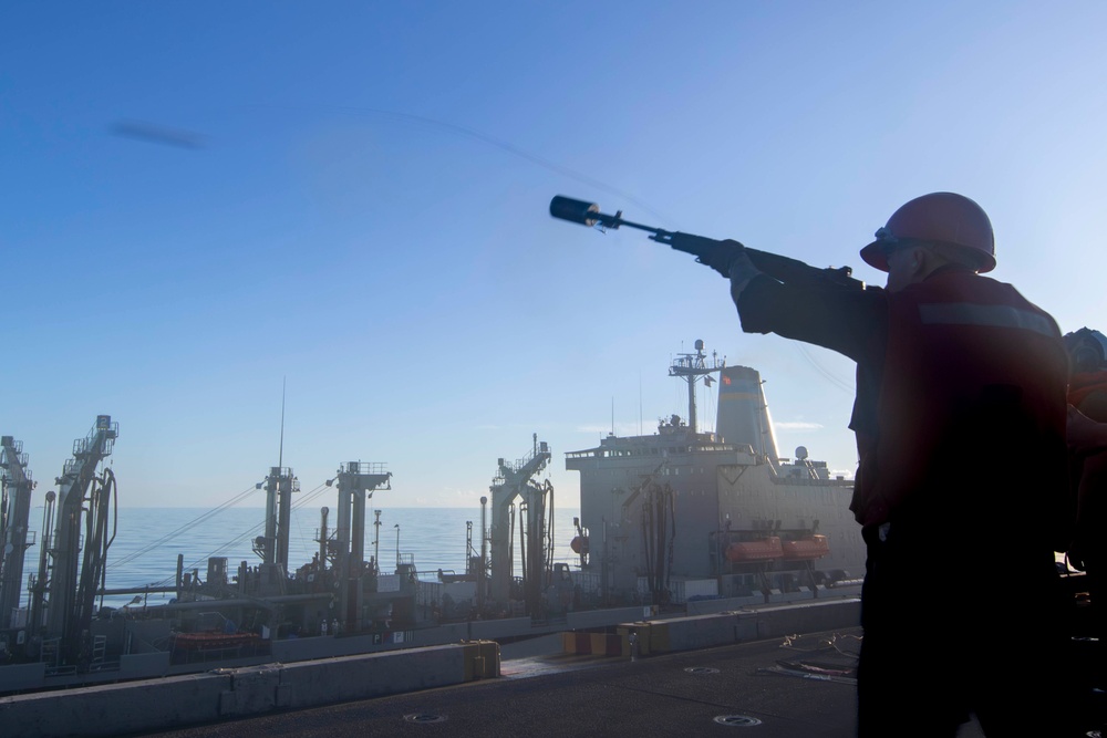 Abraham Lincoln conducts a replenishment-at-sea (RAS)