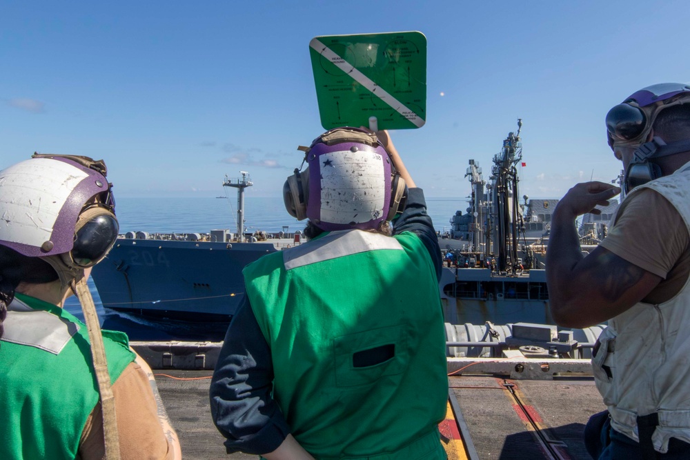 Abraham Lincoln conducts a replenishment-at-sea (RAS)