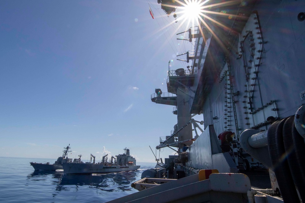 Abraham Lincoln conducts a replenishment-at-sea (RAS)