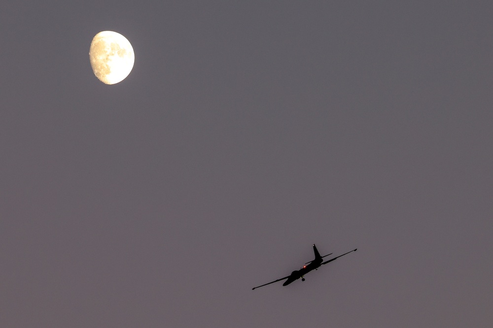 TU-2S Dragon Lady flies at dusk