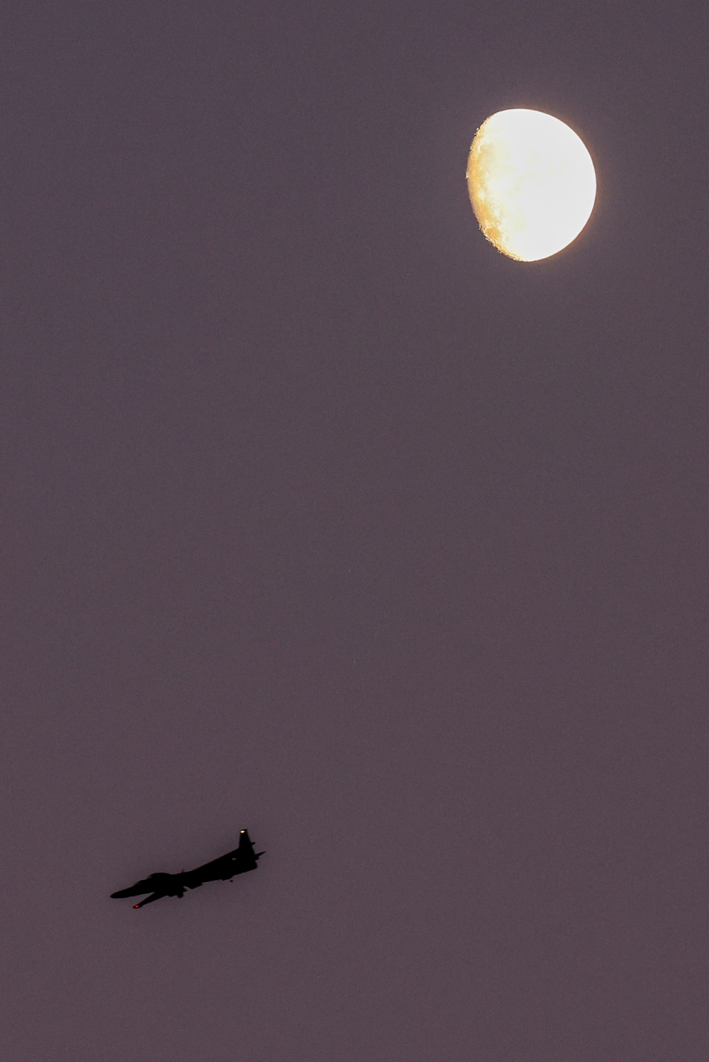 TU-2S Dragon Lady flies at dusk