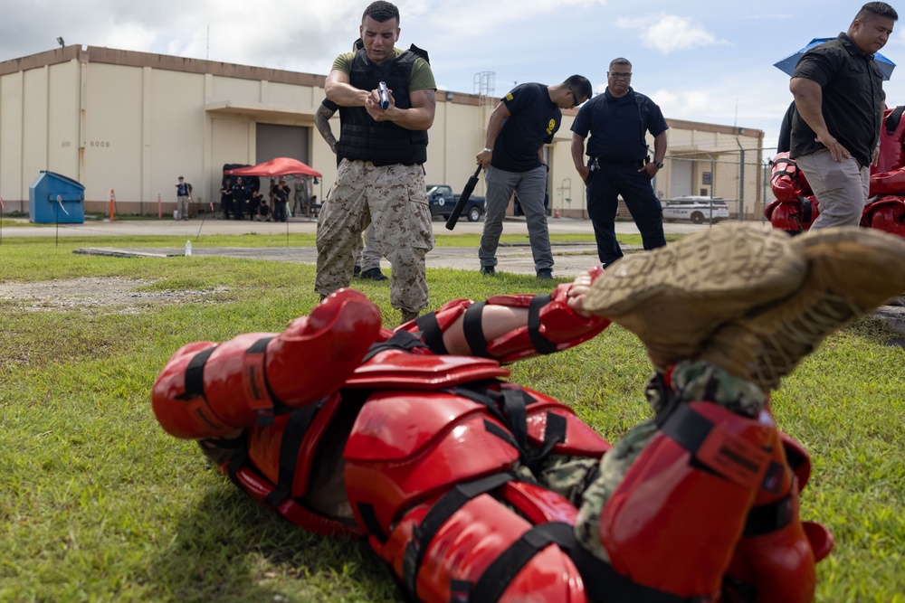 Camp Blaz PMO Marines participate in the OC course