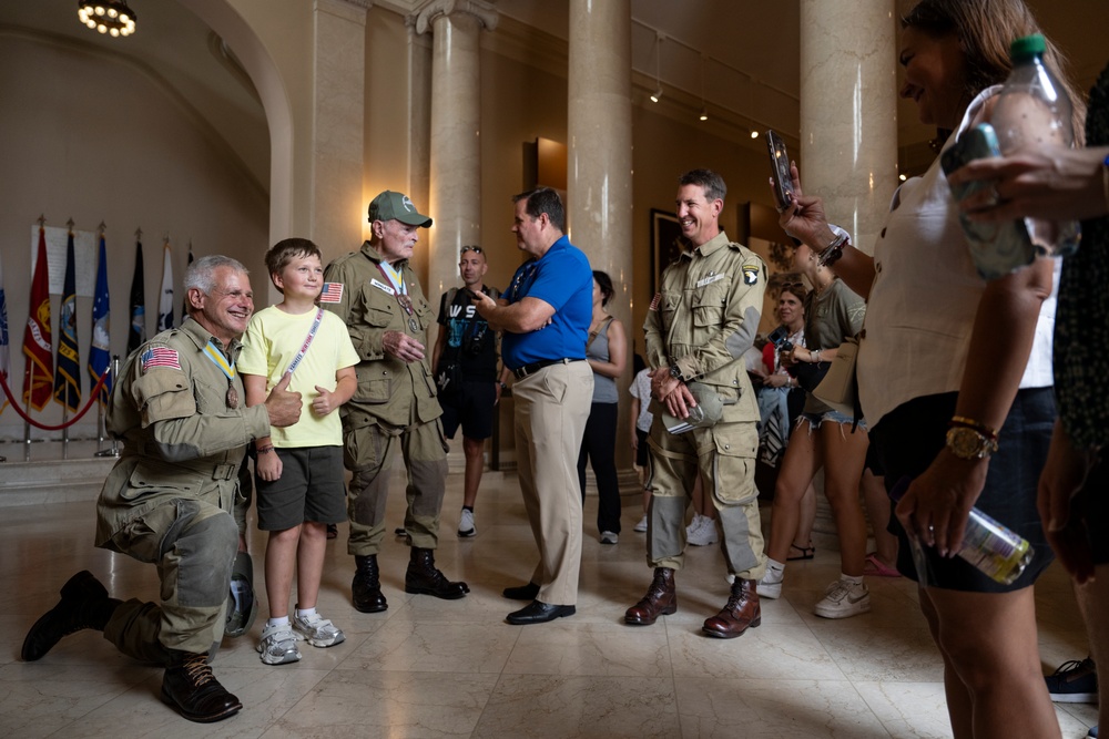 Members of Round Canopy Parachuting Team Visit Arlington National Cemetery for National Airborne Day