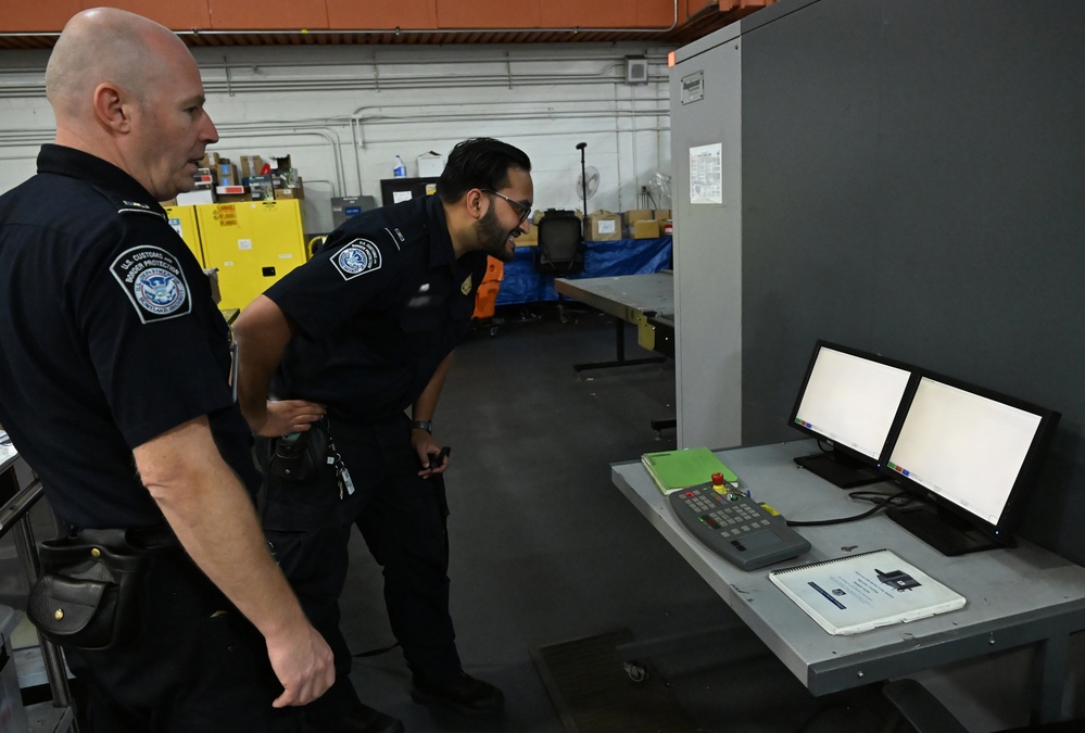 CBP K9 Handlers search for counterfeit pharmaceuticals at JFK