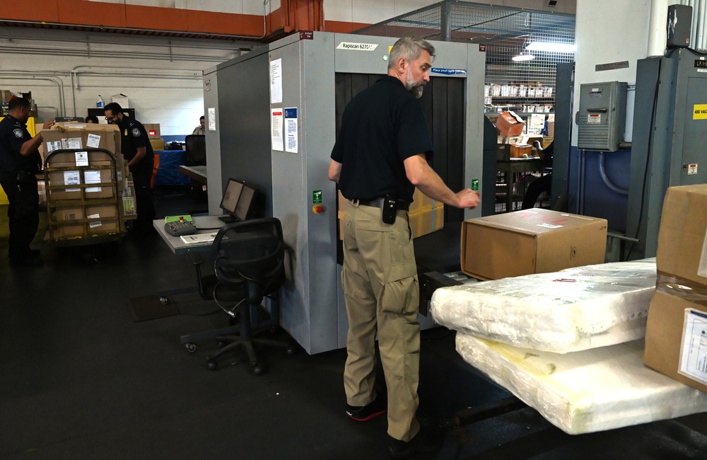 CBP K9 Handlers search for counterfeit pharmaceuticals at JFK