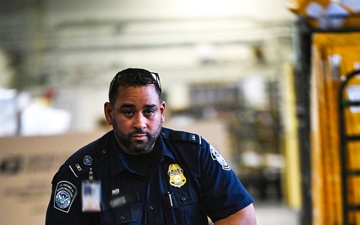 CBP K9 Handlers search for counterfeit pharmaceuticals at JFK