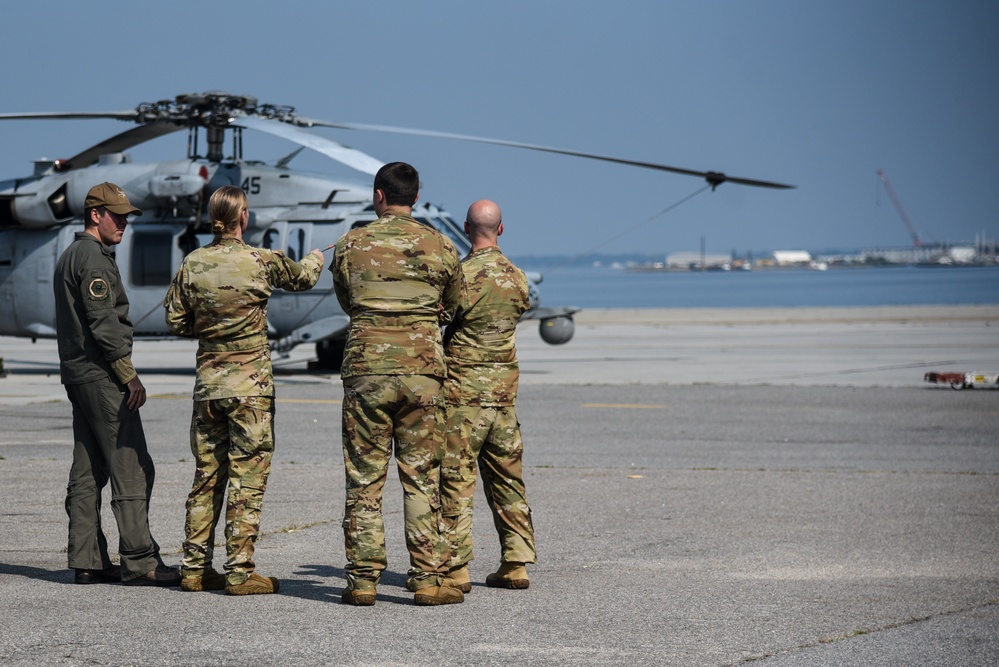 Virginia National Guard flight crews join flyover honoring U.S. Navy Vietnam veteran