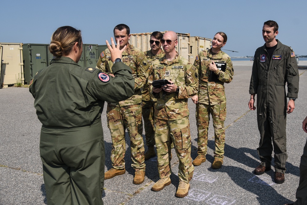 Virginia National Guard flight crews join flyover honoring U.S. Navy Vietnam veteran