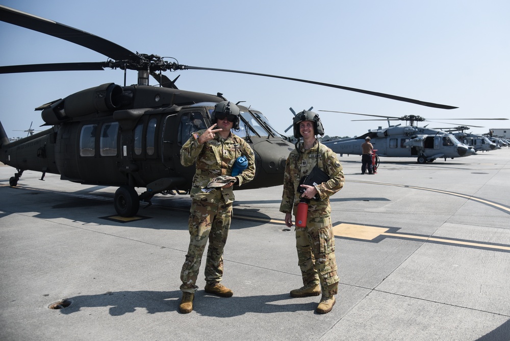 Virginia National Guard flight crews join flyover honoring U.S. Navy Vietnam veteran