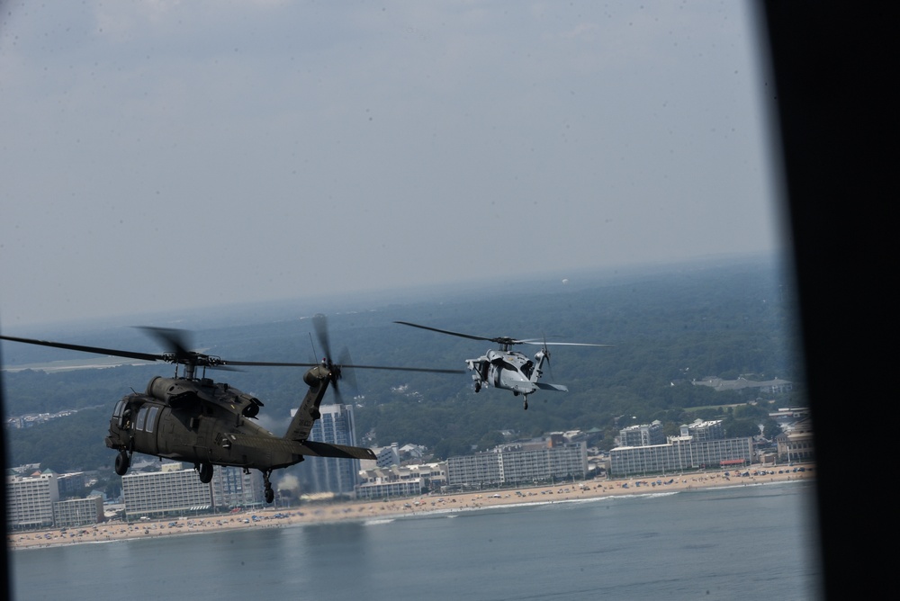 Virginia National Guard flight crews join flyover honoring U.S. Navy Vietnam veteran