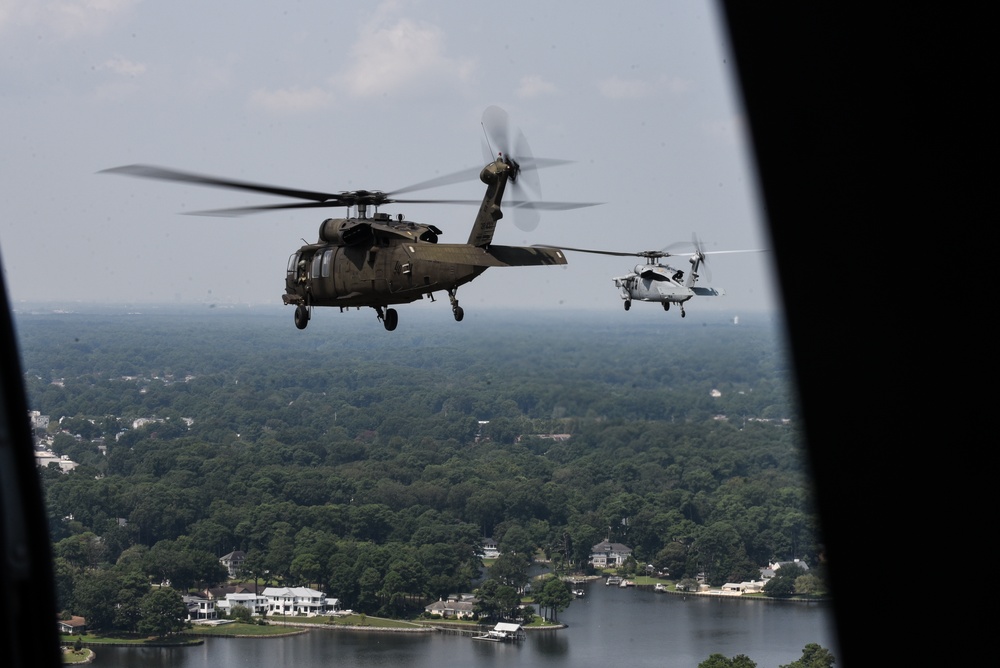 Virginia National Guard flight crews join flyover honoring U.S. Navy Vietnam veteran