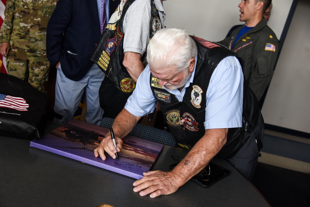 Virginia National Guard flight crews join flyover honoring U.S. Navy Vietnam veteran