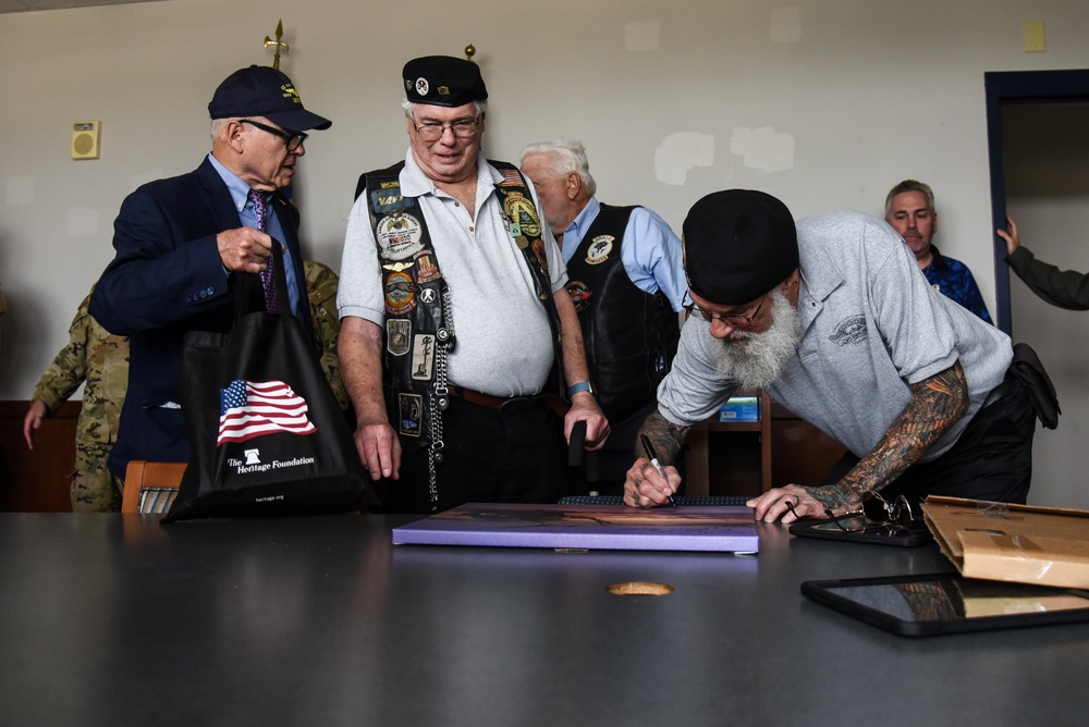 Virginia National Guard flight crews join flyover honoring U.S. Navy Vietnam veteran