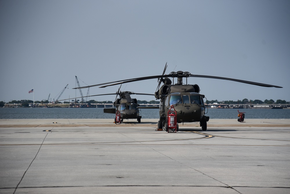 Virginia National Guard flight crews join flyover honoring U.S. Navy Vietnam veteran