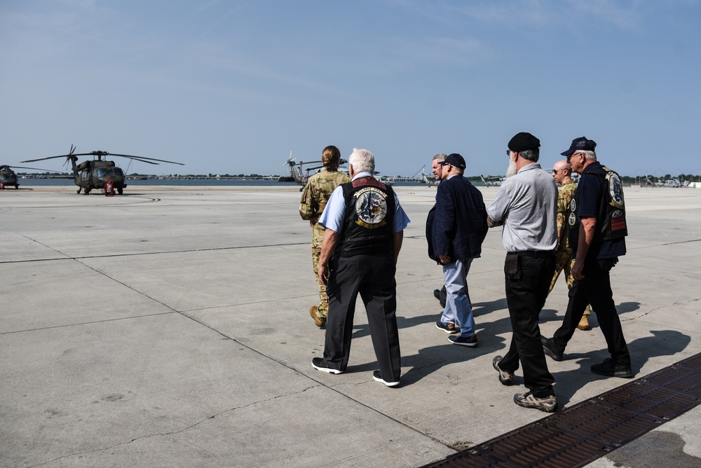 Virginia National Guard flight crews join flyover honoring U.S. Navy Vietnam veteran