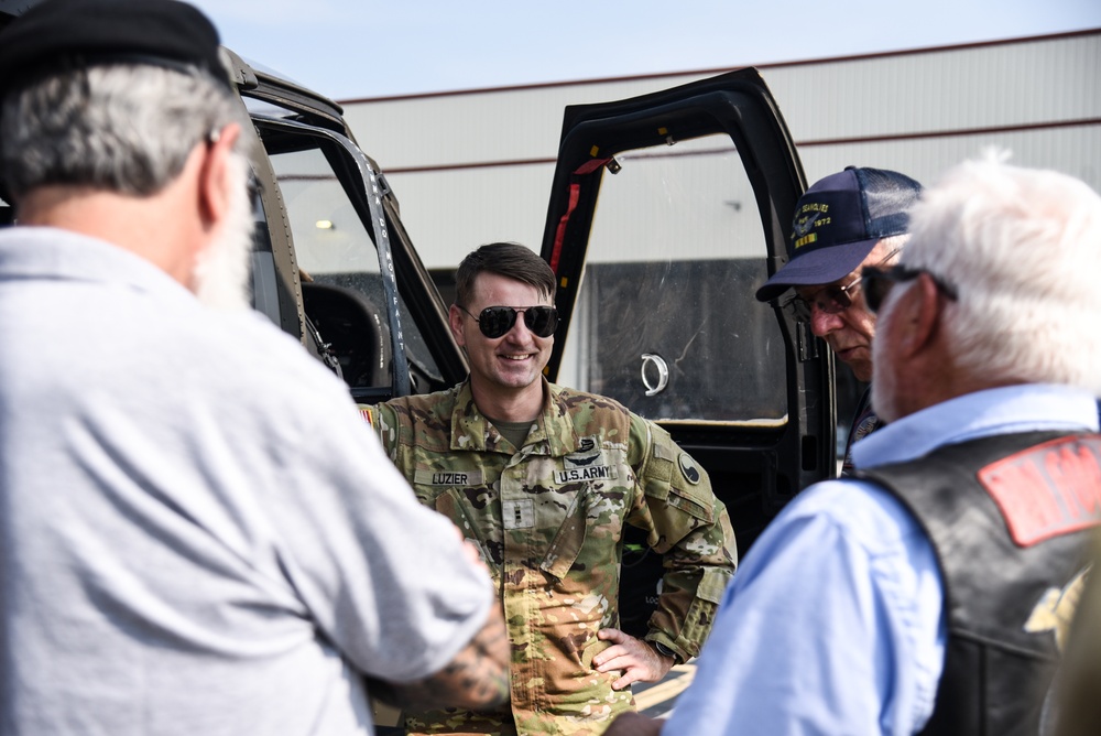 Virginia National Guard flight crews join flyover honoring U.S. Navy Vietnam veteran