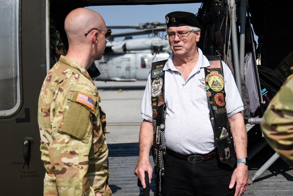 Virginia National Guard flight crews join flyover honoring U.S. Navy Vietnam veteran