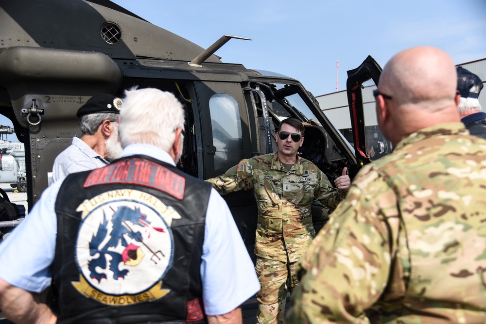 Virginia National Guard flight crews join flyover honoring U.S. Navy Vietnam veteran