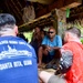 U.S. Coast Guard visits with residents of Satawal Atoll, FSM, following rescue