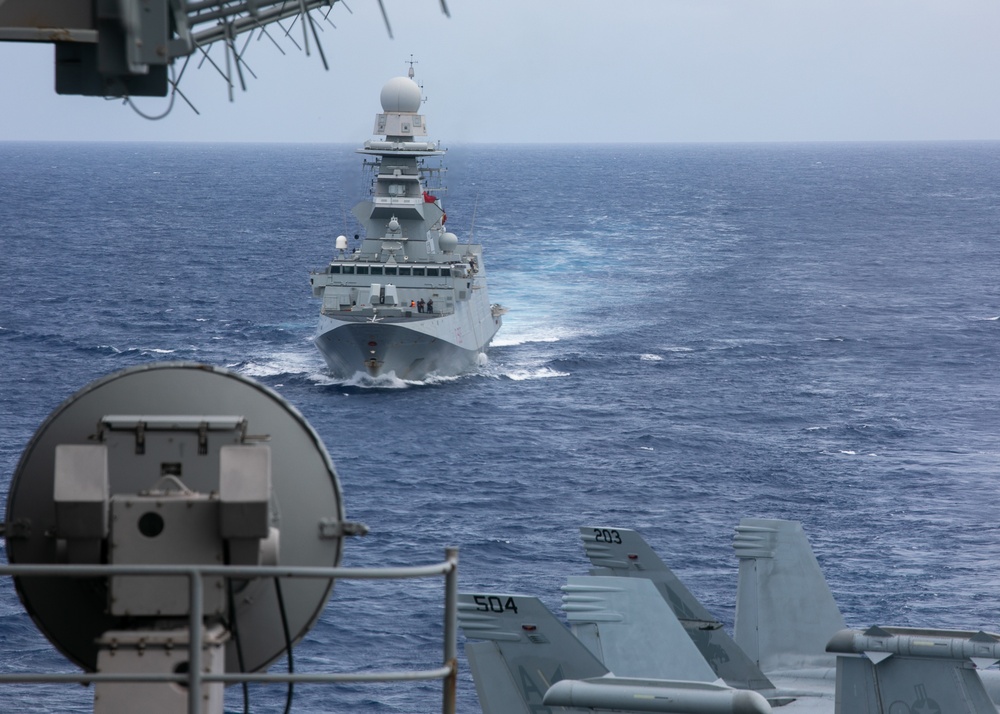 ITS Carabiniere (F 593) steams near USS Harry S. Truman
