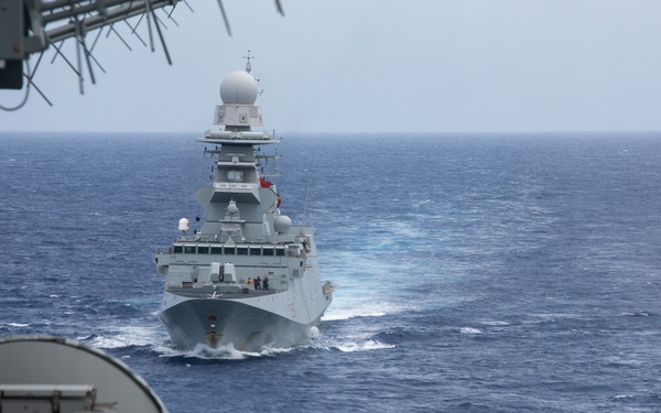ITS Carabiniere (F 593) steams near USS Harry S. Truman