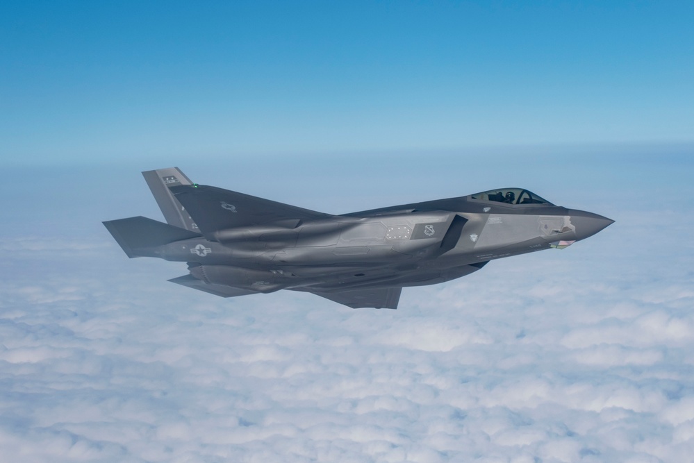 Alaska F-22s and F-35s refuel from a KC-46 during RF-A 24-3