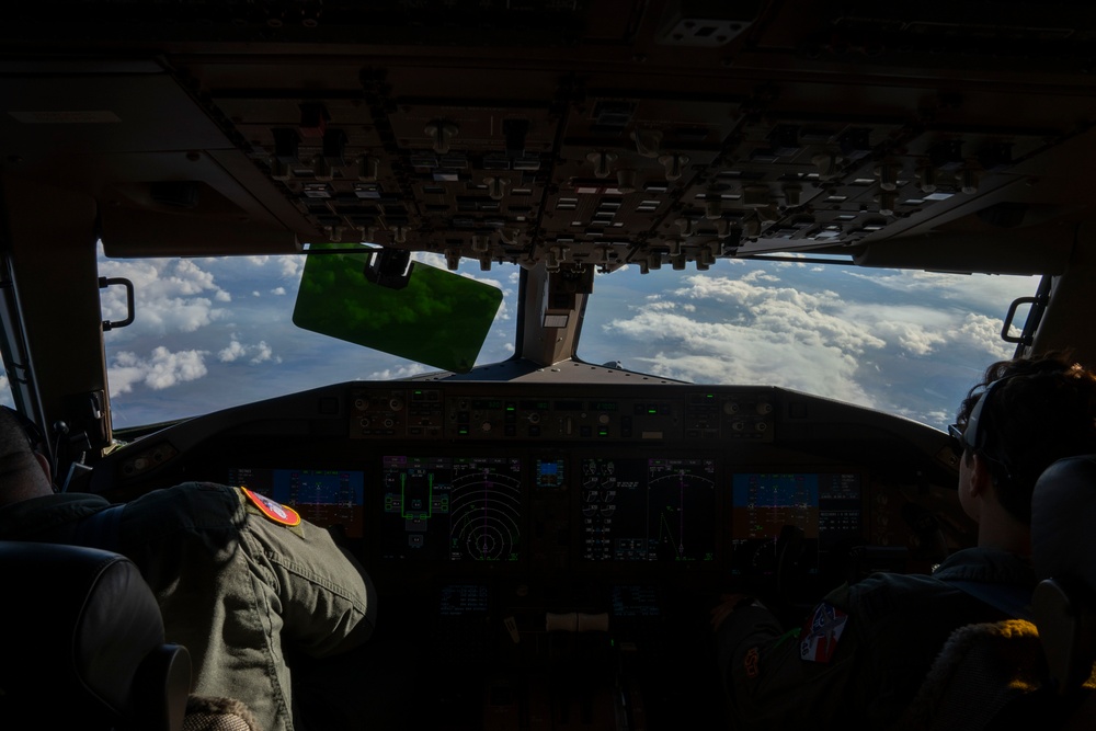 Alaska F-22s and F-35s refuel from a KC-46 during RF-A 24-3