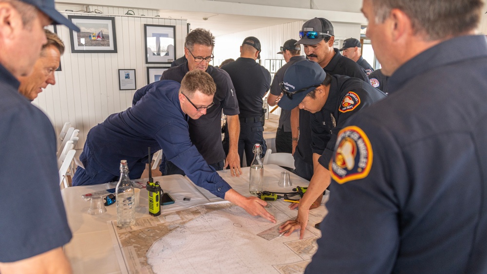 U.S. Coast Guard Members Build Partnerships At An Inter-agency Search and Rescue Coordination Training