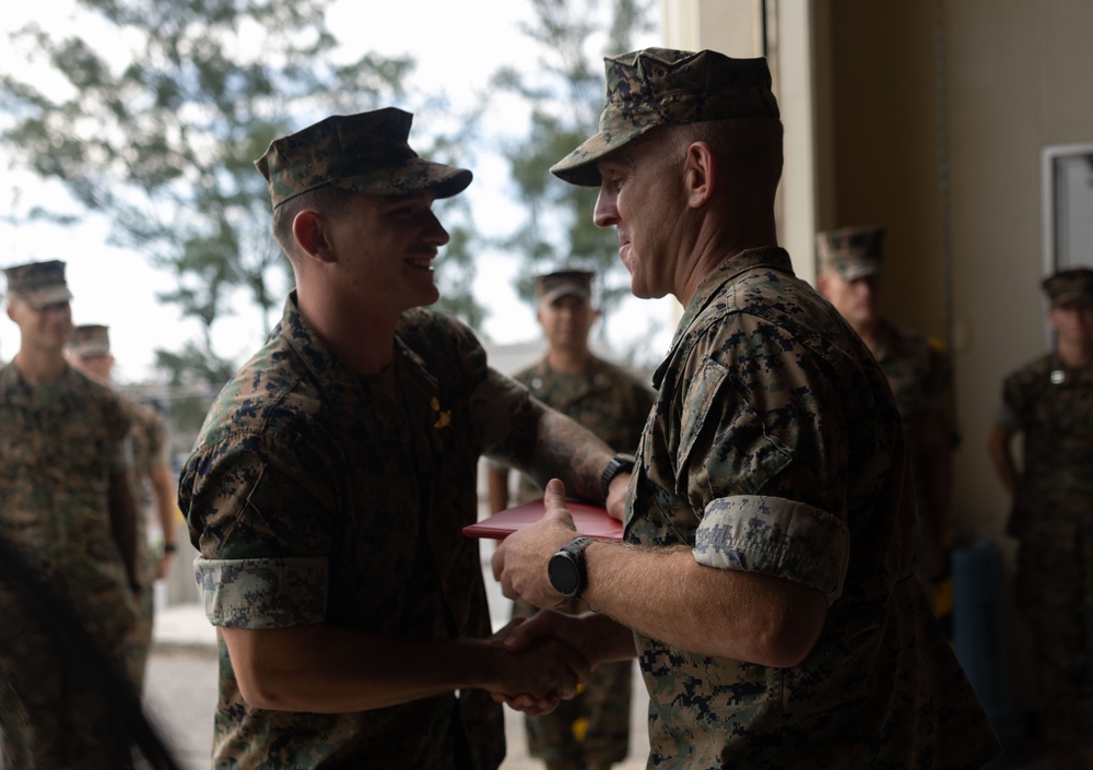 3d Marine Division Commanding General Presents 3d Marine Division NCO of the Quarter Award