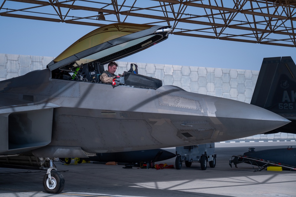 F-22 Raptors take-off within the USCENTCOM AOR
